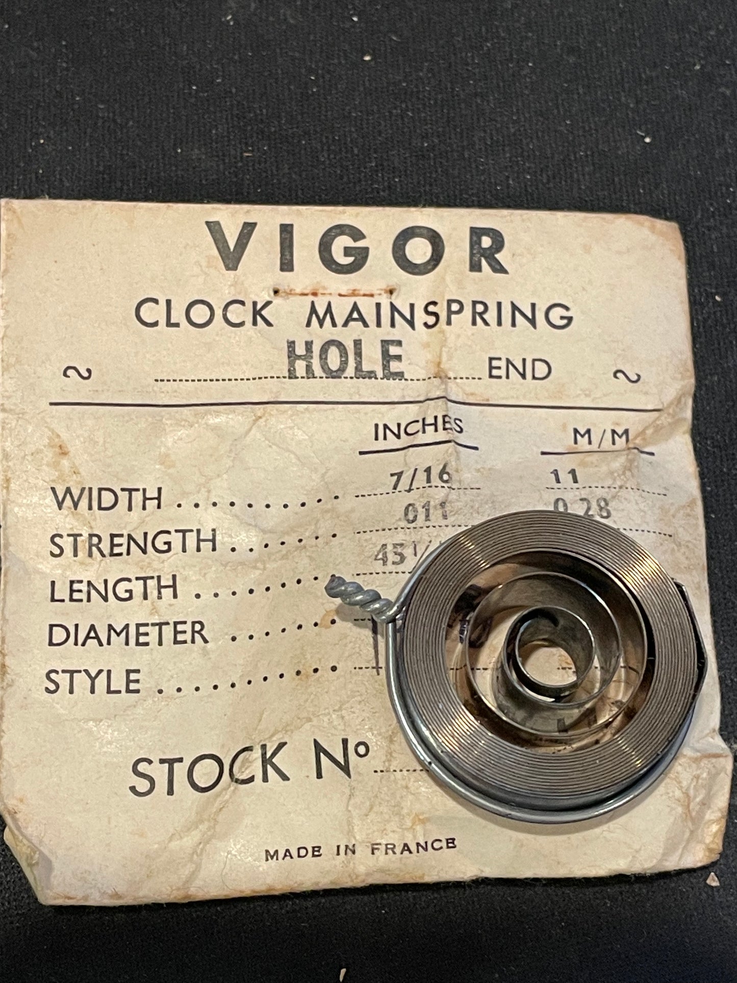 Vigor HOLE End Clock Mainspring - 7/16" x .011" x 45¼" Long - CMH 110.3