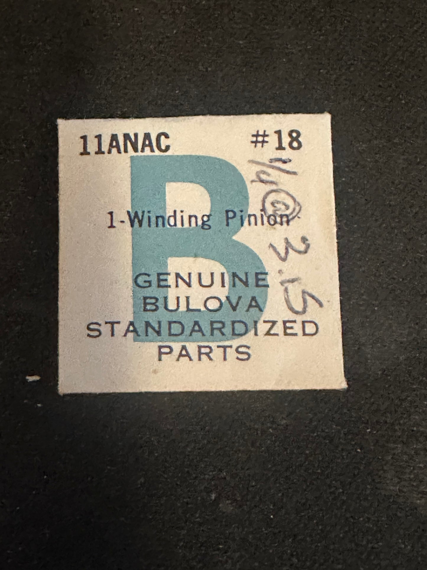 Bulova Factory winding pinion #18 for caliber 11ANAC - new in envelope