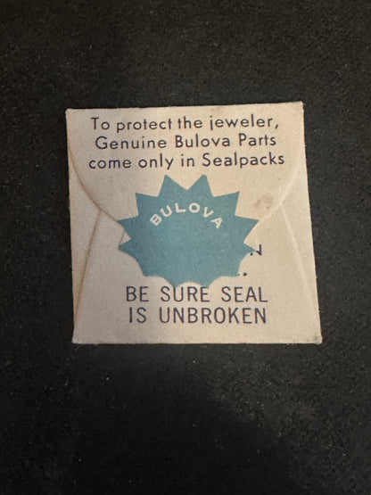 Bulova Factory winding pinion #18 for caliber 11ANAC - new in envelope