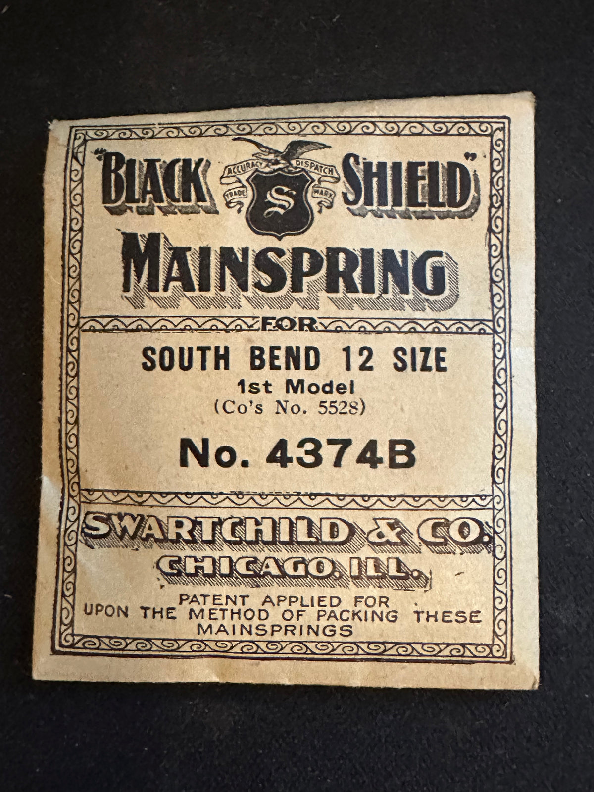 Swartchild Black Shield Mainspring #4374B for 12s South Bend No. 55528 - Steel