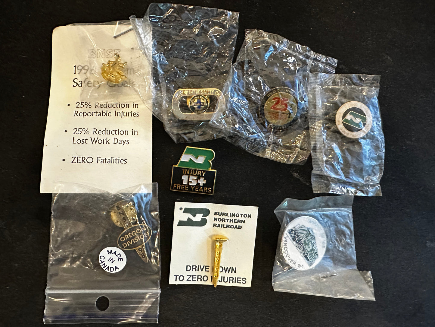 Lot of 8 Burlington Northern & BNSF Safety Award & related RR hat pins